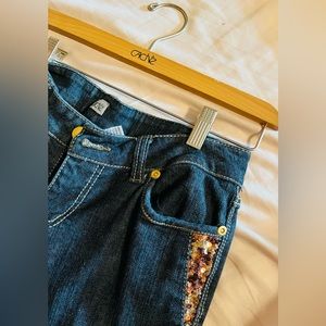 Denim Cache fitted jacket/wide leg pants set with  leopard sequins throughout.